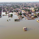 This aerial view shows a flooded residential area after heavy monsoon rains in Balochistan province on August 29, 2022